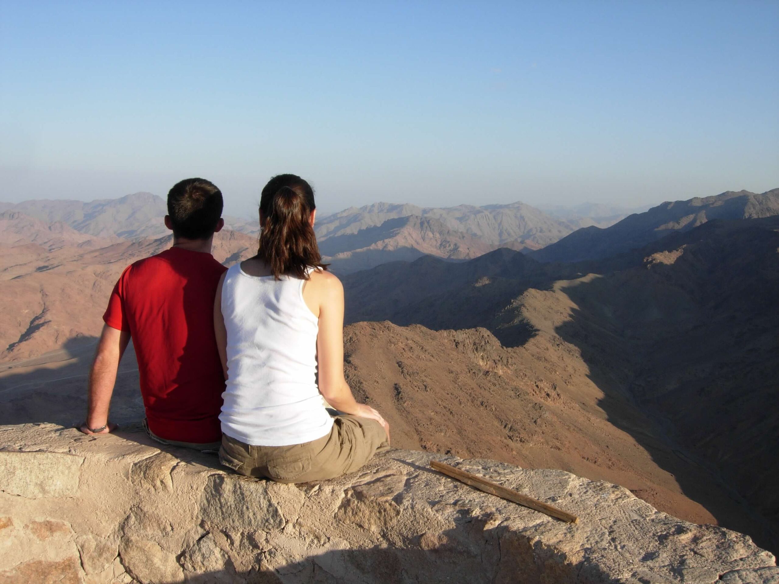 man and woman at the top of mount sinai in Egypt